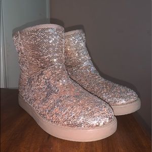 Pink sparkly boots.